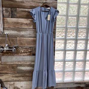 NWT size small jumpsuit in Dusty blue with pockets